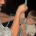 Хорор снимак! Пијани отац конопцем спустио сина са 7. спрата како би забавио пријатеље, дете га преклињало!