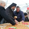 Svečano lomljenje božićne česnice sa patrijarhom ispred Hrama Svetog Save
