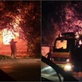 Buknuo požar u kući u Pančevu Porodica pobegla na ulicu, vatrogasci se bore sa plamenom (video)