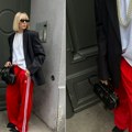 Athleisure estetika i modna nostagija za devedesetim vratile su nam crvenu adidas Firebird trenerku u fokus Festivalski…