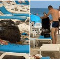 Poneli užinu na plažu pa otišli da se bućnu, kad su izašli iz vode dočekao ih prizor iz horor filma (VIDEO)
