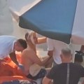 Hitna pomoć mu previja rane: Prve slike sa mesta pucnjave u Budvi: Ranjen saradnik Luke Bojovića, napadač ga na bazenu pogodio…
