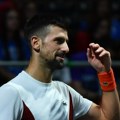 Novak je (već) uzeo trofej u Melburnu /foto, video/