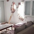 "Nestvarno, ovde kao atomska da je pala": Nevreme napravilo ogromne rupe u zidu stana na Ledinama (Foto)