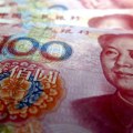 Peking preko državnih banaka prodaje dolare za juane