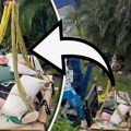 Kranom spasli muškarca teškog preko 270 kilograma: Isekli zid kuće i izneli ga na brodskoj paleti!