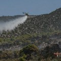(FOTO) Smiruju se šumski požari u Grčkoj, vatrogasci i dalje u pripravnosti