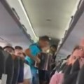 Harmonika u avionu za luku dončića! Oduševljenje zbog scene tokom leta iz LJubljane za Beograd (video)