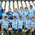Dečiji fudbal je uvek više od igre: Meridian Sport novom donacijom dresova nagradio FK Arena Kragujevac