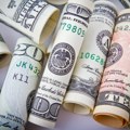 Tjedni rast dolara, euro se povlači