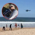 (Uznemirujuće) kamera snimila brutalan napad ajkule: Surfera (57) raskomadala morska neman, plaže hitno zatvorene (foto/video)…