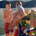 Užičanka Jana Đokić prva doplivala do krsta na Zlatarskom jezeru