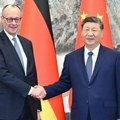 Si Đinping razgovarao sa nemačkim kancelarom Fridrihom Mercom