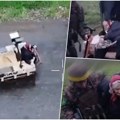 Шок снимак! "Бако, седи" Погледајте како робот спасава старицу из ратне зоне у Украјини (видео)