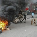 Ima poginulih u sukobu sa policijom: Potpuni haos na Haitiju - Pripadnici paravojne formacije ubijeni u razmeni vatre (foto)