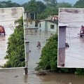 Borba za život! Poplave razorile grad Bračni par rasplakao svet: Zagrljeni čekaju pomoć, a oko njih horor scena (video)