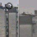 (Video) Oluja "teroriše" Kragujevac, kiša lije, a on na krovu zgrade! Ljudi u šoku - "Šta to radiš čoveče?"