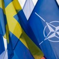 Švedska zastava zavijorila se ispred sedišta NATO (VIDEO)