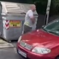 (Video) Otvorila se rupa usred Beograda, automobil propao: Točak se zaglavljen u velikom krateru na ulici, ne može ni makac