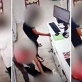 Snimak jezive krađe u apoteci u Beogradu: Dečak čuva stražu dok devojčica i drug obaraju ženu na pod
