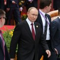 Bivši italijnaski premijer: Video sam Putina u Pekingu, pridržavale su ga dve osobe