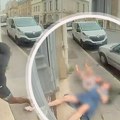 Horor usred dana: Beskućnik pratio devojčicu i njenu baku, zgrabio ih iz kuće i bacio na trotoar (foto, video)