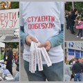 Studenti širom Srbije dele nalepnice "Studenti pobeđuju", ispred Skupštine transparent vlasti
