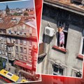 (Video) Šok scena u centru grada: Pogledajte kako ova Beograđanka pere prozore na vrhu zgrade