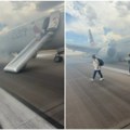 Dramatična evakuacija putnika na letu American Airlines-a usled incidenta sa stajnim trapom (VIDEO)