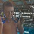 Umalo da bude "treća sreća": Osmogodišnji Vanja iz Zrenjanina u jednom danu osvojio dve medalje za plivanje (foto)