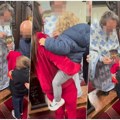 "Slava Bogu" Veljko i Bogdana odveli sinove na pričešće, mali Željko oduševio svojim ponašanjem, stao prvi u red (foto)
