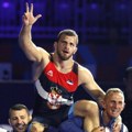 Rus koji je zbog ljubavi i supruge postao Srbin: Ko je Aleksandar Komarov, novi prvak sveta u rvanju?