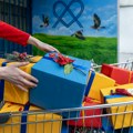 Lidl vilenjaci podelili mališanima Novogodišnje paketiće