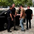 Sa lisicama na rukama: Igor Popović doveden u sud u Prištini (video)