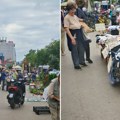Ulica ispred Futoške pijace živi svojim ritmom Od čarapa do starih servisa a sve se prodaje sa kartona