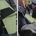 Putin ima novo oružje! Prvi telohranitelj ruskog predsednika snimljen kako nosi misteriozno futurističko oružje (video)