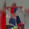 Pojavio se snimak: Pogledajte kako maloletnica u Baru cepa i pljuje zastavu Srbije (video)