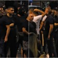 Muškarci u crnom, neki sa fantomkama, naoružani motkama u Kneza Miloša VIDEO