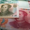 Kineski investitori sele novac sa kopna, pritiskajući domaću valutu