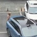 Žena čuvala parking za muža, a onda je vozač drugog auta uradio ovo: Sekunda koja je zapalila internet! (video)