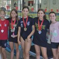 Plivači Proletera briljirali u Futogu: Osvojene 22 medalje i dva ekipna pehara na Prvenstvu Vojvodine Plivački klub Proleter