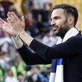 Fabregas veran Komu
