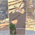 Delovi zgrade rasuti po ulici, smrskan automobil Oluja napravila haos u Mladenovcu, snimak sa lica mesta je strašan! (video)
