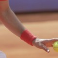 Suspendovan dvostruki grend slem šampion