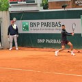 FOTO Novak trenirao i po kiši: Dan posle velike pobede izašao na teren