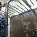 (ФОТО) Оптужени за напад у Москви стигли на суд након испитивања: Једном фали део ува, други у колицима…