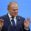 Tusk zatražio od Merza da očuva Schengen