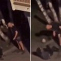 Pretukao devojku ispred policijske stanice! Prvo je krvnički šamarao, a onda je šutirao na podu - "niko ništa" (video)