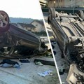 Prve slike nakon nesreće u Rakovici: Automobil na krovu, srča svuda po putu, dvoje povređenih