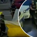 Drama u Beogradu! Muškarac pretio da će skočiti sa zgrade, vatrogasci munjevito raširili dušek (video)